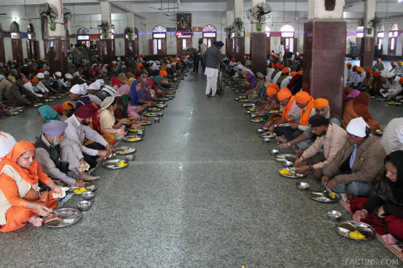 People Sitting At the Floor to have food